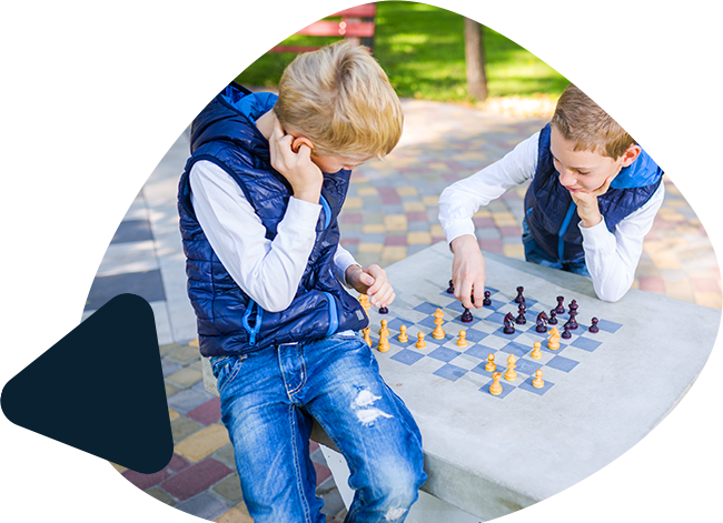 2 boys playing chess